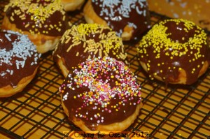 Baked Donuts with chocolate glaze and sprinkles