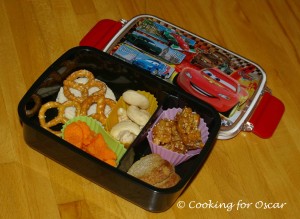 Snack Box with pretzels, dried fruit, cashews, carrot shapes, biscuits and cereal bites.